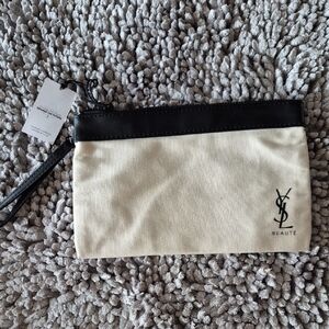 YSL Beaute Cream and Black Wristlet